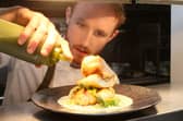 One of the chefs at San Pedro plating up a meal. Photo Jason Chadwick