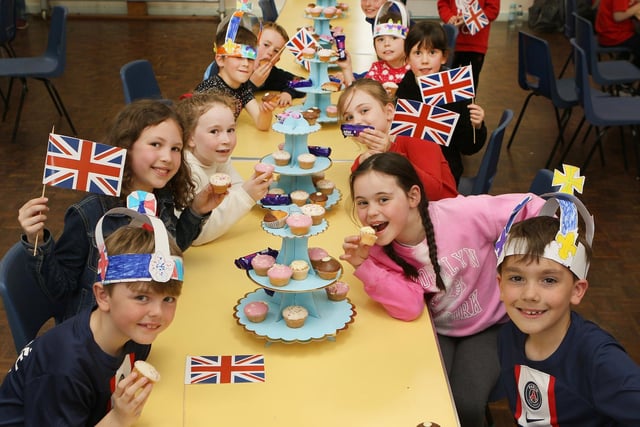 Tucking into the cakes at St Anne's Academy. Pic Jason Chadwick
