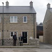 Paul Downing, a trustee of Bradwell Community Land Trust, and Clare Wilkins, Peak District National Park community policy planner.
