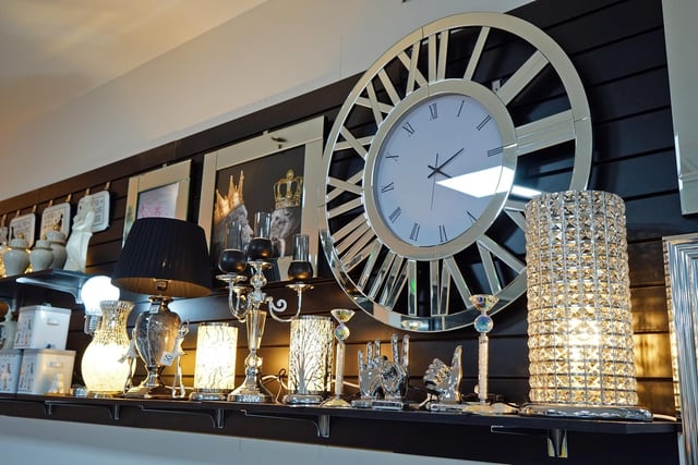 A selection of clocks and lights on sale at the new Simpson Furniture store in Buxton