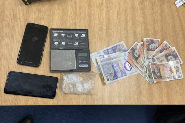 Cash, mobile phones and drugs are among the items seized. Photo - Buxton Safer Neighbourhood Team