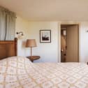 Downstairs was a comfy bed, tea and coffee-making facilities, complimentary bottled water in the fridge and delicious Chatsworth biscuits. The decor throughout was classic and tasteful - well placed artwork, solid wooden furniture and luxurious fabrics.