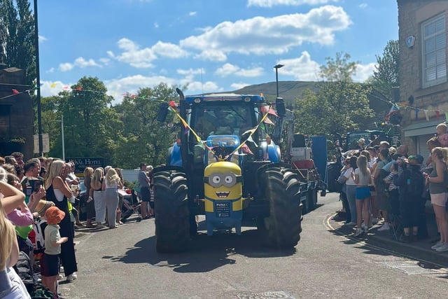 Polka Plant Hire Ltd, a Buxton based company, brought a Minion on a tractor to the May Queen parade where hundreds lined the streets to see the procession. Photo Josh Redferrn
