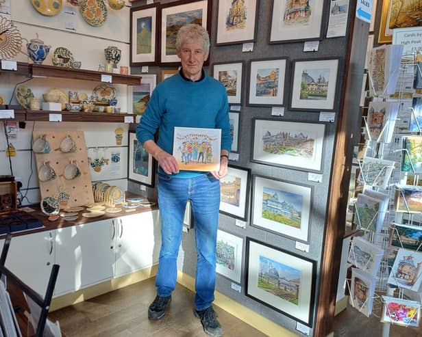 David Steeden of High Peak Artists with his winning design for the 2025 Buxton Fringe programme, 'Joyful'.
