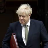 British Prime Minister Boris Johnson walks from 10 Downing Street to a meeting with his ministers at the Foreign Office, in London (AP Photo/Matt Dunham, file).