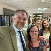 Auctioneer Charles Hanson (left) with his colleagues.