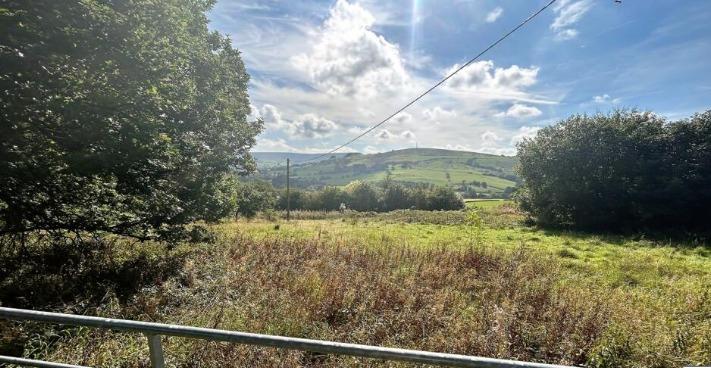 A small piece of land, currently used for grazing with far reaching views. The land extends to approximately 0.93 Acres and is bordered by stone walling and fencing.