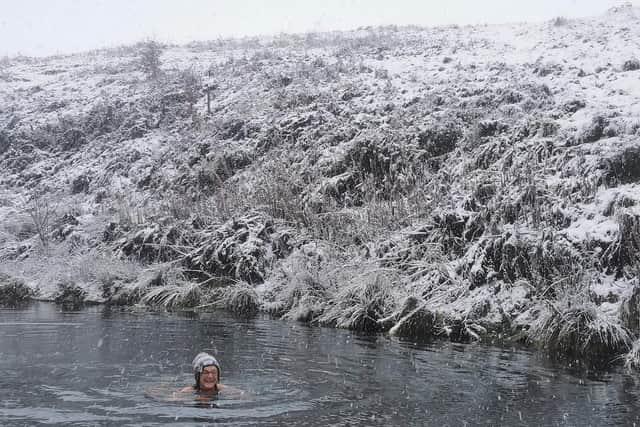 Debbie Rushworth enjoys a bitter blizzard swim
