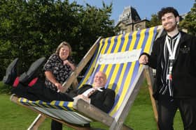 Sue, Regan and Philip at the Palace Hotel putting their feet up. Photo Jason Chadwick