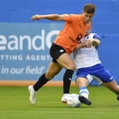 New Buxton defender Josh Granite in action for Barrow against Chesterfield.