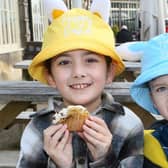 Holly and Elliot O'Brien enjoyng a cake, Easter activities at the Pavilion Gardens. Photo Brian Eyre