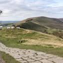 A helicopter lifting materials for the restoration of Mam Tor in the Peak District. Photo National Trust - Paul Harris