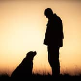 VILLAGER JIM AND HIS LOYAL LABRADOR
