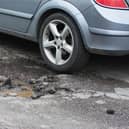 Derbyshire is receiving “peanuts” in road repairs funding compared to London, leaving it to make “sticking plaster” repairs, an MP and council leader have said.