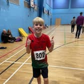 George Murcott, aged 9, who was competing for the first time for High Peak AC.