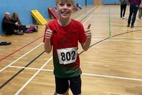 George Murcott, aged 9, who was competing for the first time for High Peak AC.