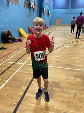 George Murcott, aged 9, who was competing for the first time for High Peak AC.