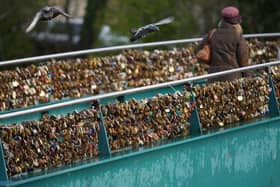 Thousands of padlocks known as 'love locks' adorn Weir Bridge across the River Wye on December 29, 2021 in Bakewell, England. (Photo: Christopher Furlong/Getty Images)