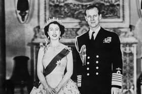 Queen Elizabeth II poses with Prince Philip, Duke of Edinburgh, on June 2, 1953, before her coronation, in London. (Photo by INTERCONTINENTALE / AFP) (Photo by -/INTERCONTINENTALE/AFP via Getty Images)