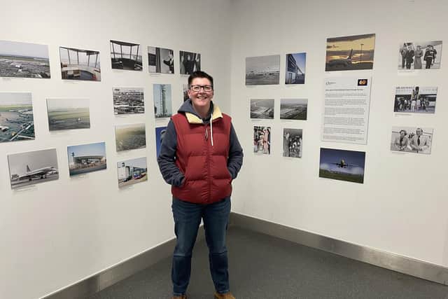 Photographer Tracey Whitefoot at the exhibition she curated