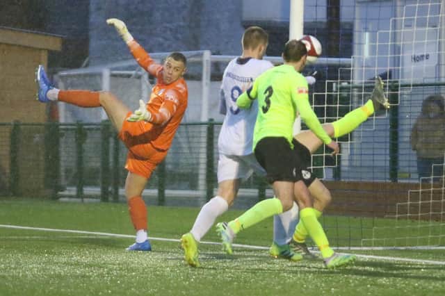 The ball is hooked off the line to deny Buxton a winner at the end.