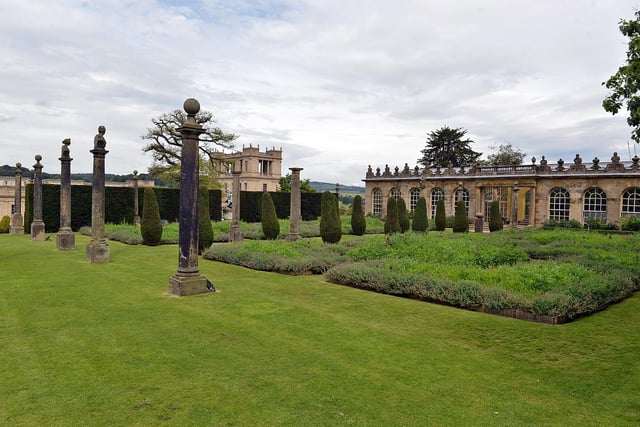 In the mid 18th century which landscape architect was commissioned to redesign the gardens at Chatsworth House?