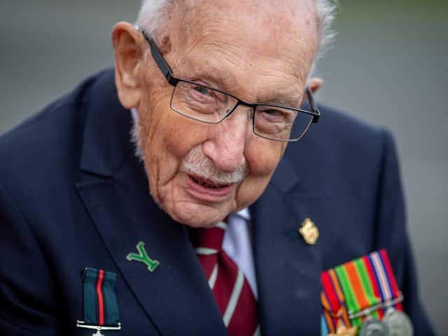 Captain Sir Tom Moore, seen visiting the Army Foundation College, Harrogate, has tested positive for Covid, his family say.