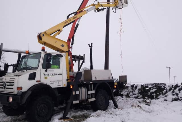 Electricity North West repairing wires in the High Peak which have been damaged by Storm Arwen.