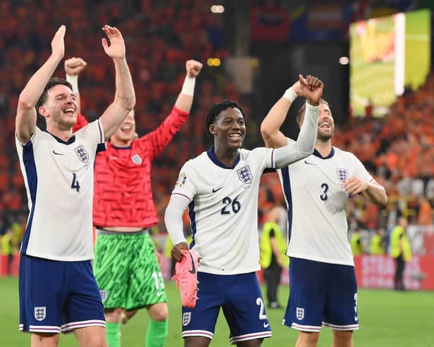 Declan Rice, Kobbie Mainoo and Luke Shaw celebrate after England beat the Netherlands during the UEFA EURO 2024 semi-final match.