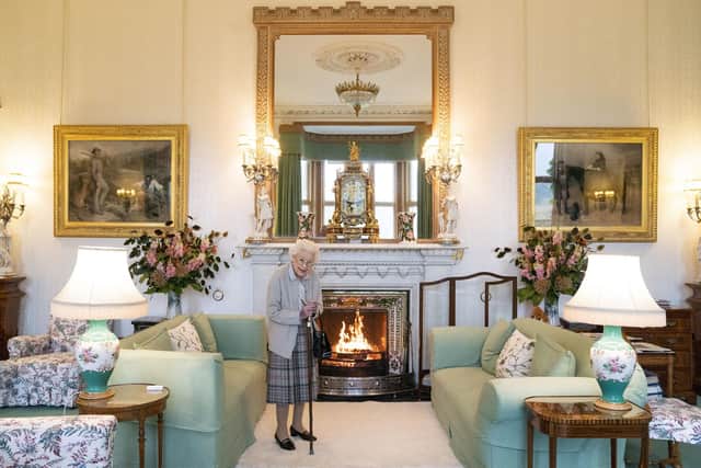 The Queen was pictured at Balmoral on Tuesday waiting to meet with the new Prime Minister Liz Truss. (Photo by JANE BARLOW/POOL/AFP via Getty Images)