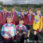 Harper Hill boys with their Midlands title-winning trophy.