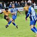 Olaolu Odipe clears for New Mills on Saturday. Photo by John Fryer.