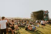 Soaking up the last of the sun's rays on the festival site at  Pikehall.