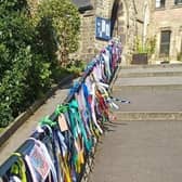 St. Anne’s, Buxton LOUDfence display of ribbon in solidarity with the victims and survivors of abuse.