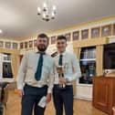 Harry Griffin (right) with captain Andrew Slater.