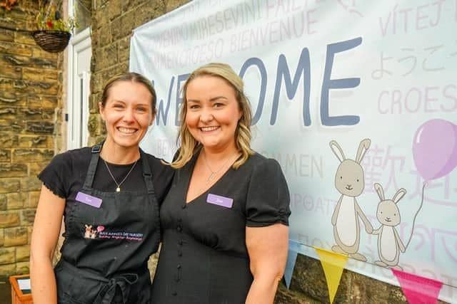 Busy Bunnies staff pictured after their good Ofsted report in the autumn are dealing with a flood at the nursery. Photo Brian Eyre