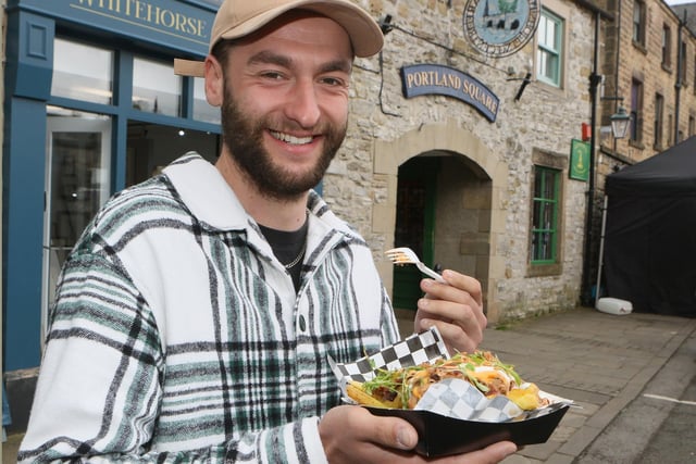 Harry Brown tries the pulled pork at Bakewell Food Festival.