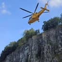The climber was transported to hospital by helicopter after their fall.  Credit: Edale MRT