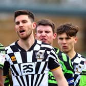 Shaun Brisley in the thick of it for Port Vale at Forest Green.