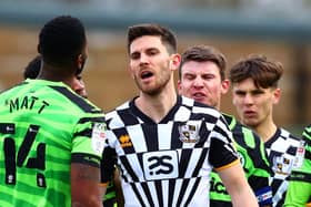 Shaun Brisley in the thick of it for Port Vale at Forest Green.