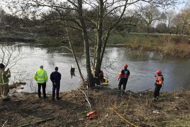 A barn owl is rescued after getting trapped in fishing line dumped by the River Derwent.