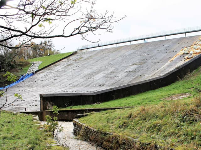 The damaged spillway at Toddbrook Reservoir.