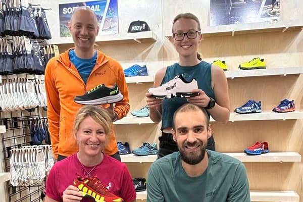 Four of the new store staff, including store manager Matt Sherwood (front right) at inov-8. Photo submitted