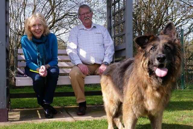 Bella with new owners Maggie Mellish and Charlie Douglas.