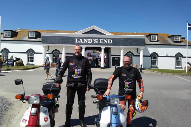 Doug Gowans, left, and Dave Glossop conquered the country on their Honda C90 mopeds.