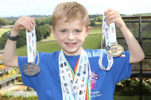 Rory Blair coming home from the Transplant Games with a chest full of medals.