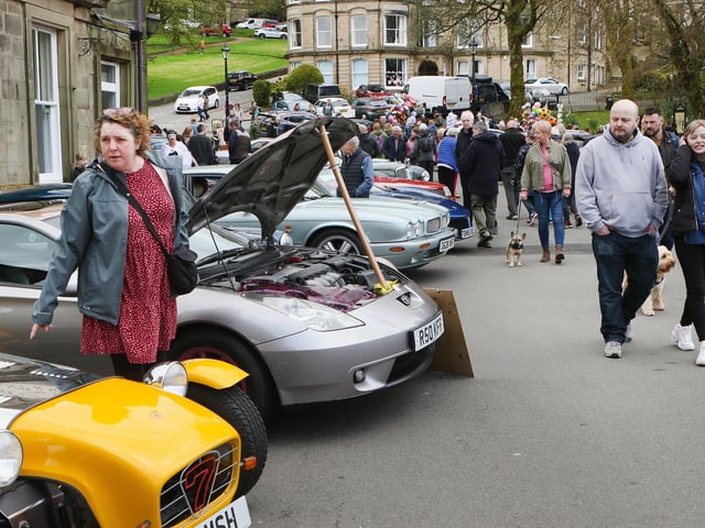People stopped to look at the cars parked up outside the Pavilion Gardens during Buxton's Spring Fair. Pic Jason Chadwick.