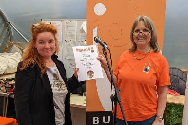 Tracey Coverley receives the Artist award from Marketing Officer, Stephanie Billen
