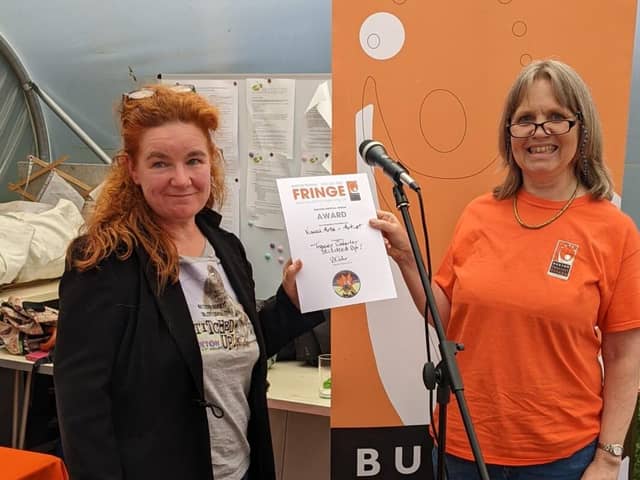 Tracey Coverley receives the Artist award from Marketing Officer, Stephanie Billen