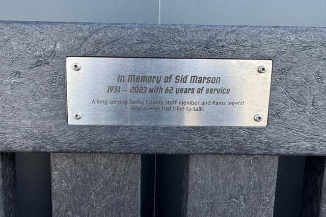 The plaque on the Sid Marson memorial bench